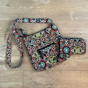 Gently used Vera Bradley cross body purse and matching zip around wallet.
